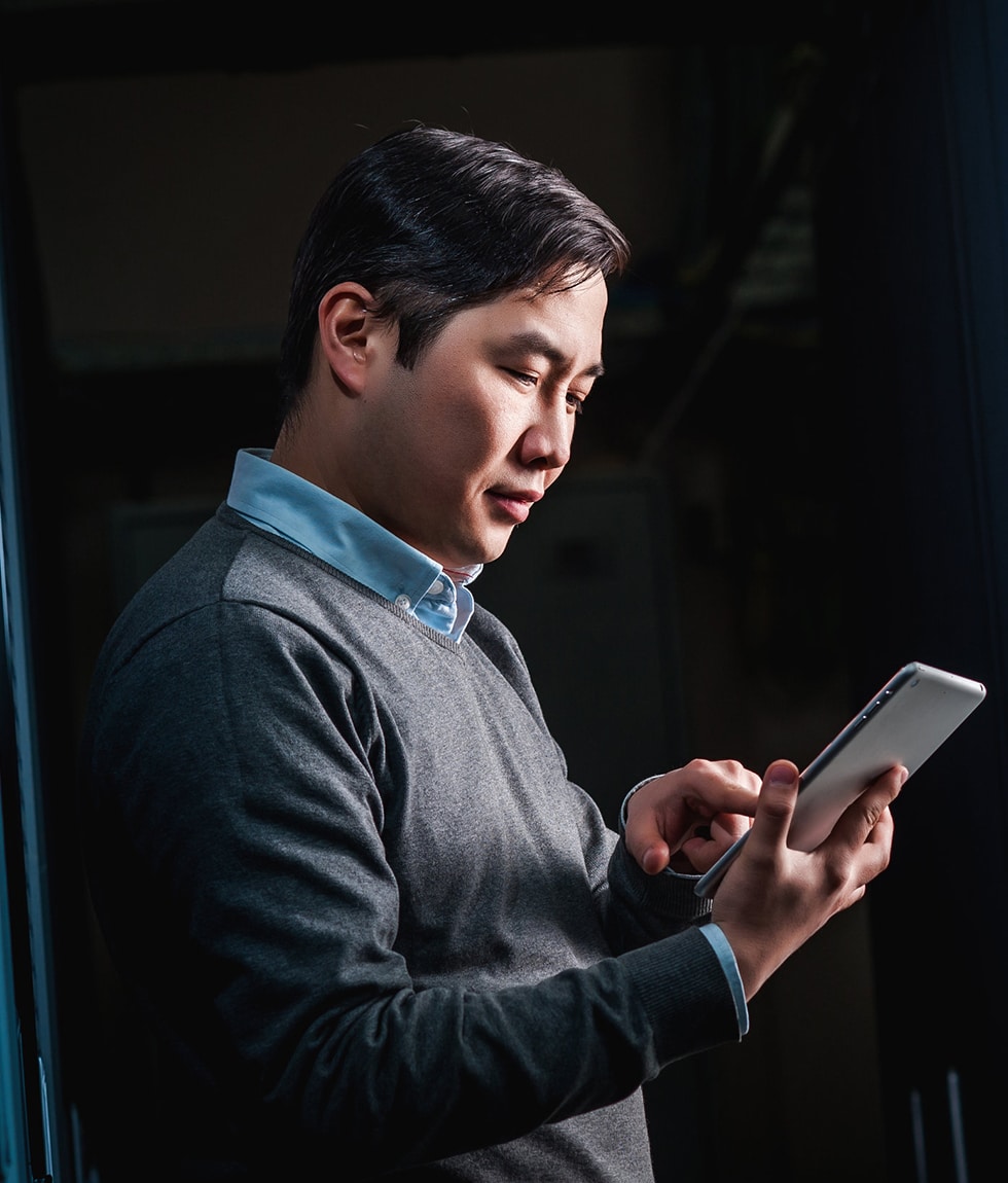 Man Holding a Dynamic Location Tracking Device