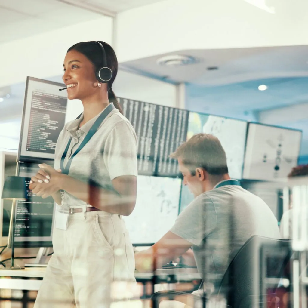 Thinking Woman and Meteorologist by Window in Office with Headset for Broadcast with News Ideas Tech and Female Weather Reporter with Climate Change Update with Forecast on Media in Workplace